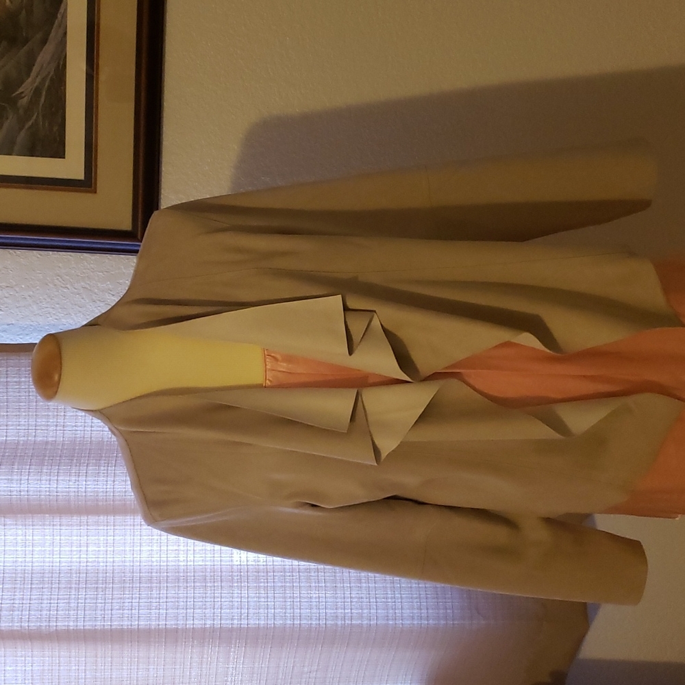 Very cute feel like swade jacket, 100% polyester  hangs nice  with jeans .